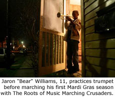 Jaron 'Bear' Williams, 11, practices trumpet before marching his first Mardi Gras season with The Roots of Music Marching Crusaders.