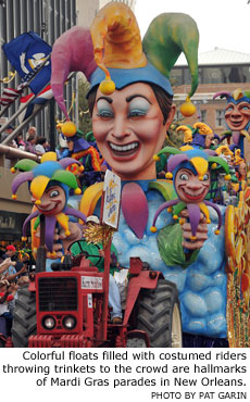 Colorful floats filled with costumed riders throwing trinkets to the crowd are hallmarks of Mardi Gras parades in New Orleans. Photo by Pat Garin