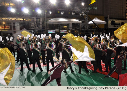 Lights, cameras and two monitors flanking the center line sign are what band members see as they perform their run-through. 2011 Macy's Thanksgiving Day Parade Photo by Marching.com