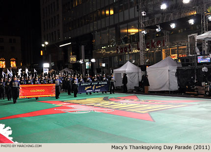 Legacy H.S. (Colorado) steps out of darkness into the bright lights for its run-through. 2011 Macy's Thanksgiving Day Parade Photo by Marching.com