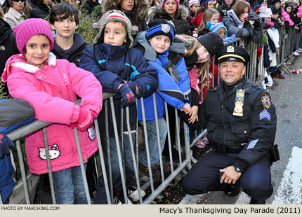 NYPD officers are providing excellent crowd control. 2011 Macy's Thanksgiving Day Parade Photo by Marching.com