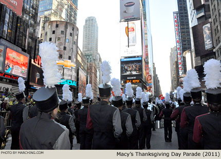 Although the parade route has changed over the years, it still marches by the brilliant lighted signs near Times Square. 2011 Macy's Thanksgiving Day Parade Photo by Marching.com