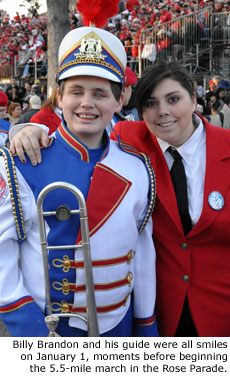 Billy Brandon and his guide were all smiles on January 1, moments before beginning the 5.5-mile march in the Rose Parade.