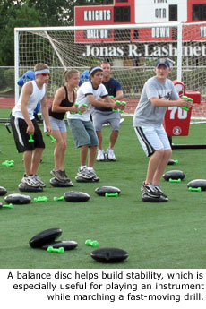 A balance disc helps build stability, which is especially useful for playing an instrument while marching a fast-moving drill.