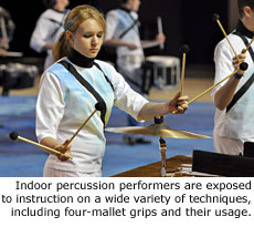 Indoor percussion performers are exposed to instruction on a wide variety of techniques, including four-mallet grips and their usage.