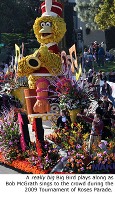 A really big Big Bird plays along as Bob McGrath sings to the crowd during the 2009 Tournament of Roses Parade.