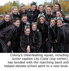 Colony's cheerleading squad, including Junior captain Lily Coyle (top center), has bonded with the marching band and helped elevate school spirit to a new level.